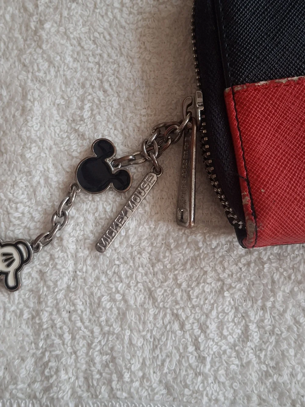 Disney Loungefly zip-around wallet featuring a white Mickey Mouse gloved hand